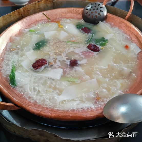 坨坨香丽江腊妈腊排鼓火锅店