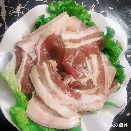 伍陆万碳烤肥牛(工布老街店)