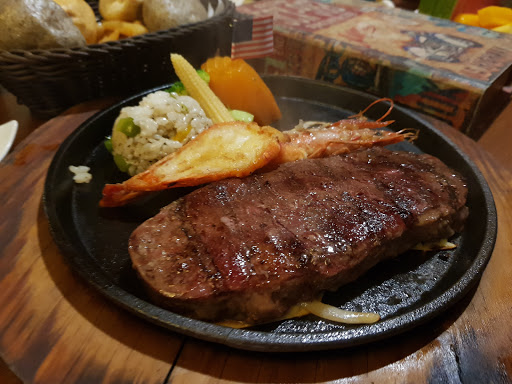 佬沃牛排屉馆