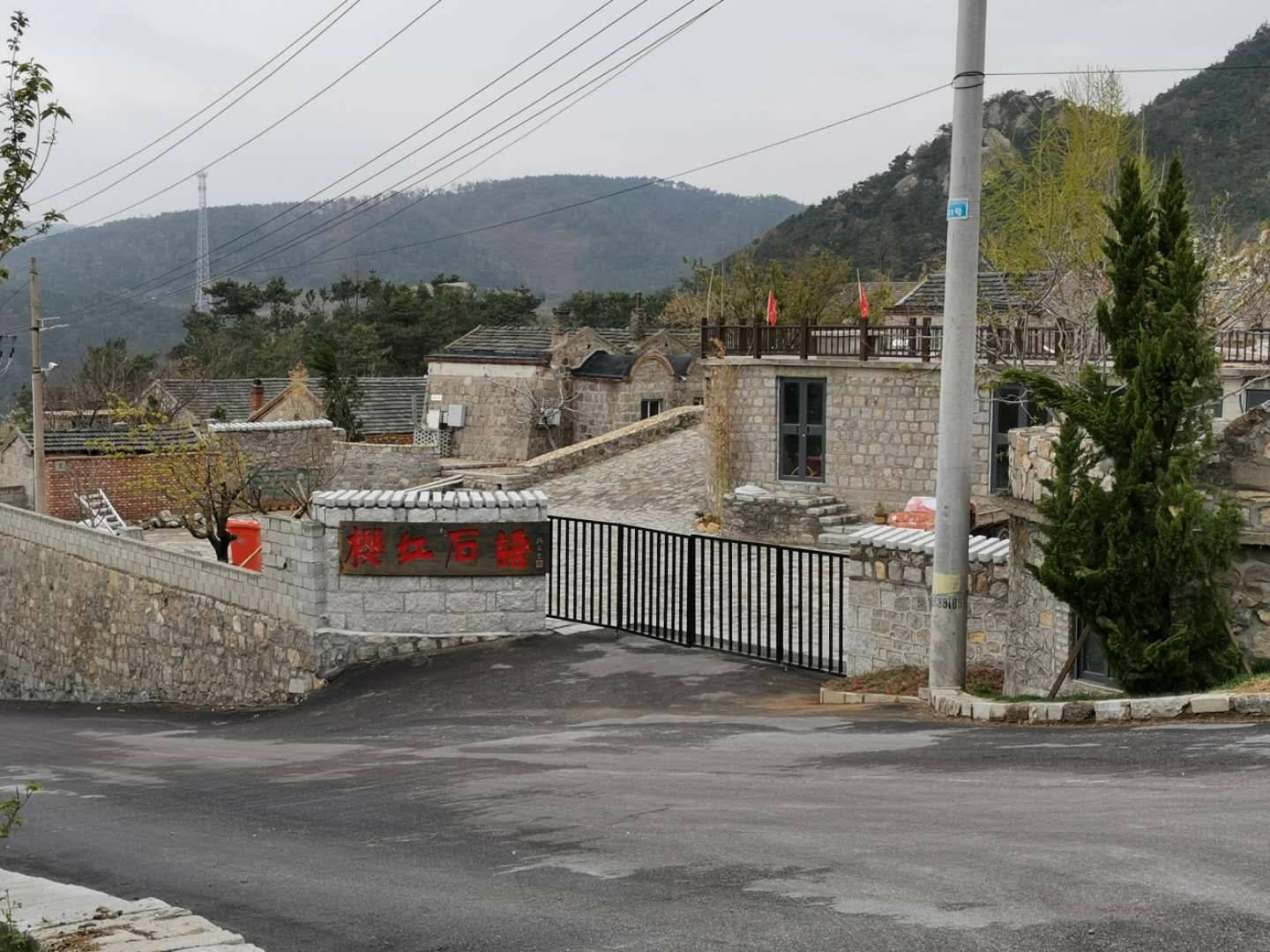 威海樱红石语客栈