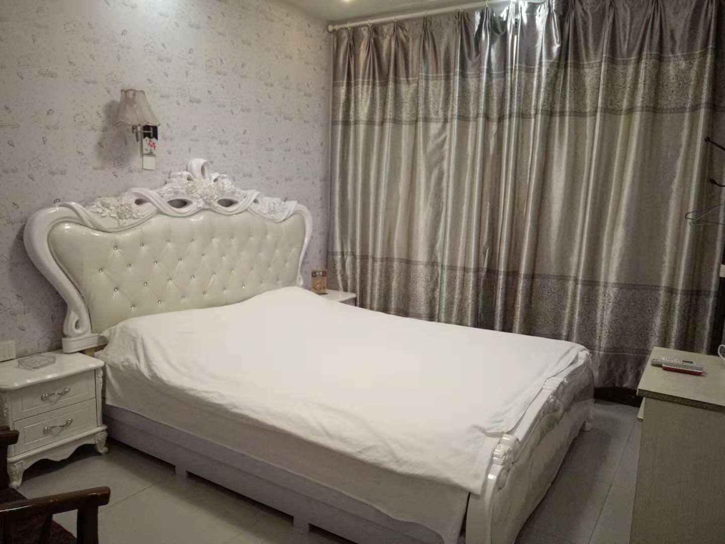 锦地宾馆(洗耳中路店)
