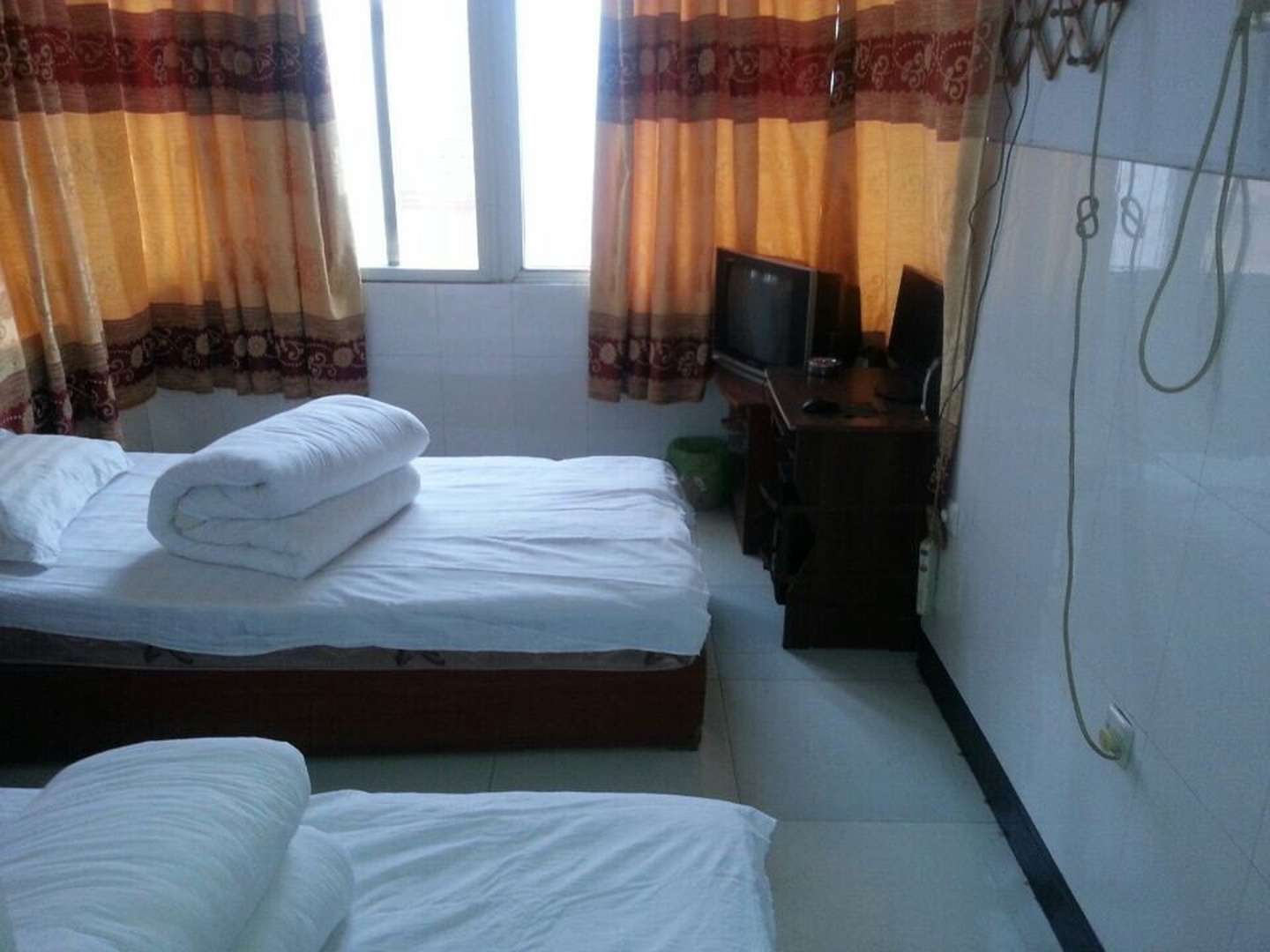 新新宾馆(周口市第六中学生活小区西北)