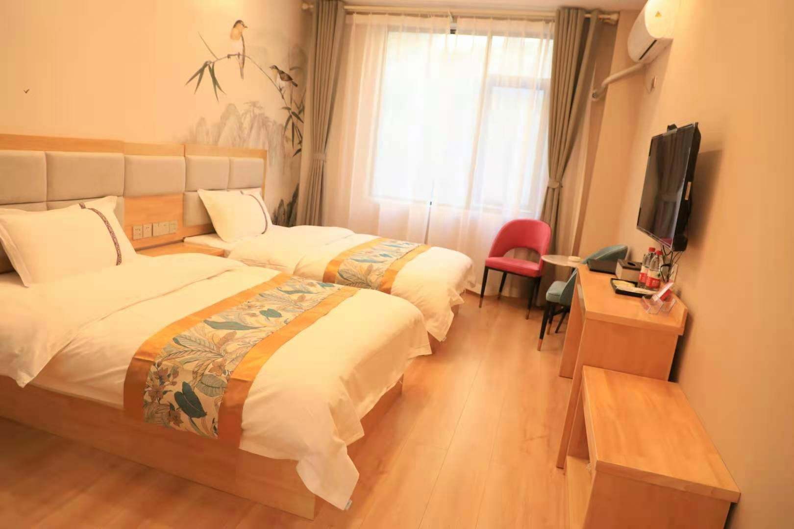 金川边城印象酒店