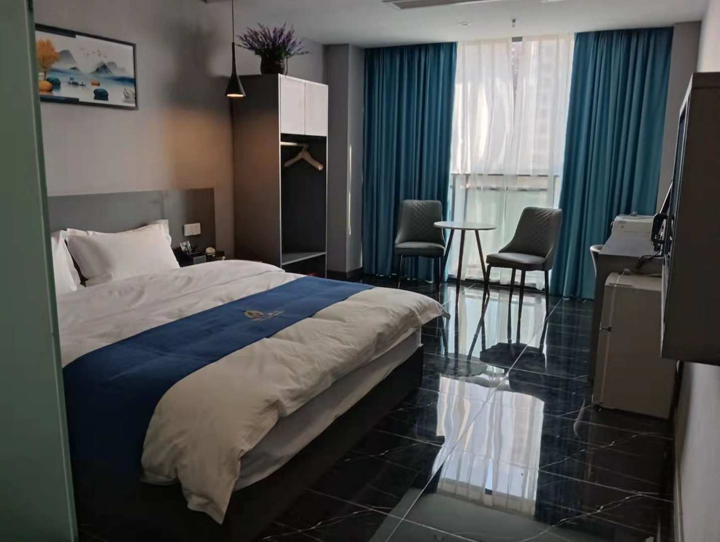 怡兰酒店(两江新区鱼复工业园鱼嘴店)