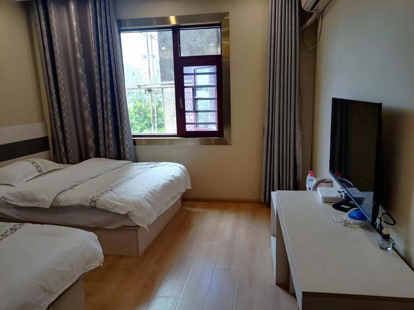 牟定悦漫酒店